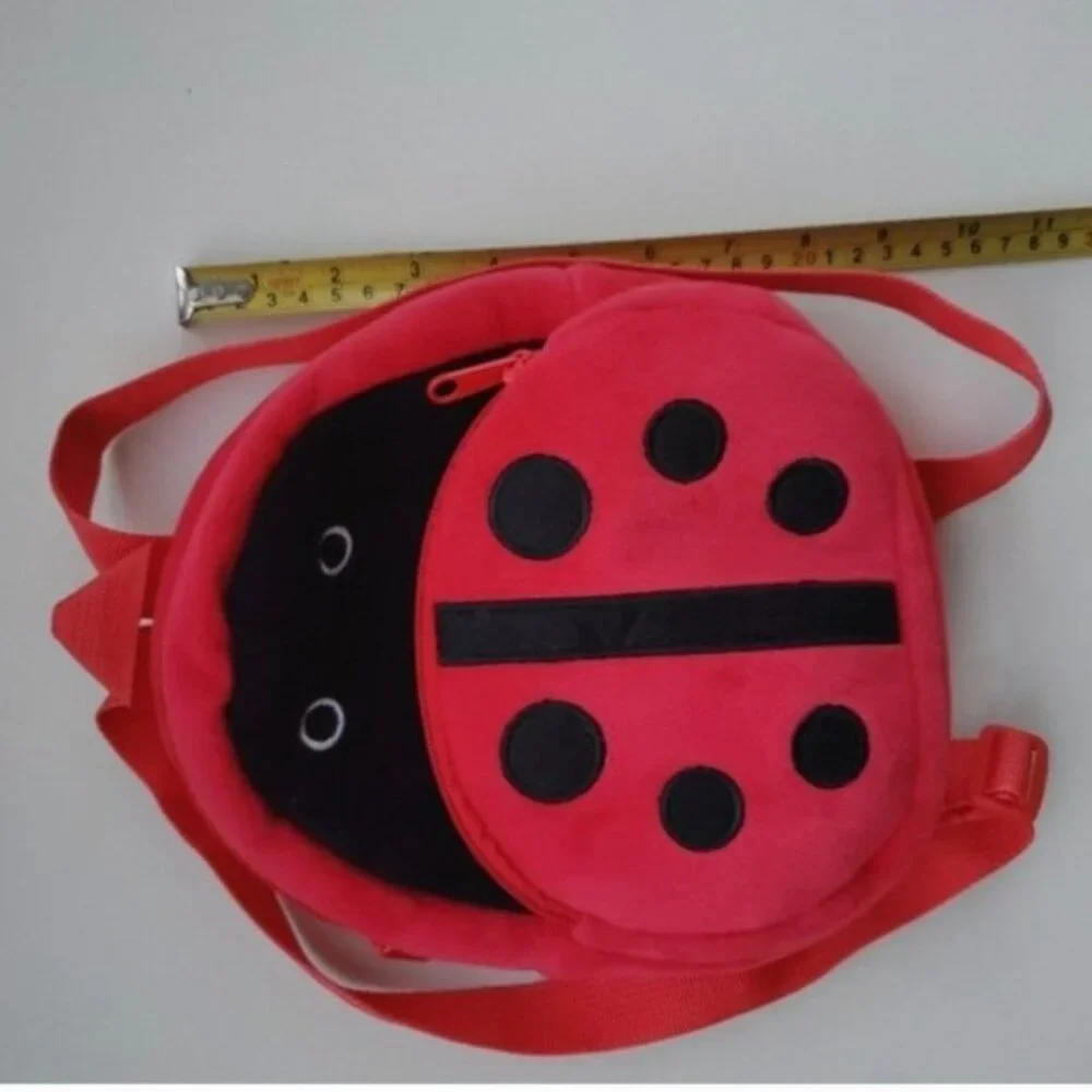 Ladybug plush fabric backpack